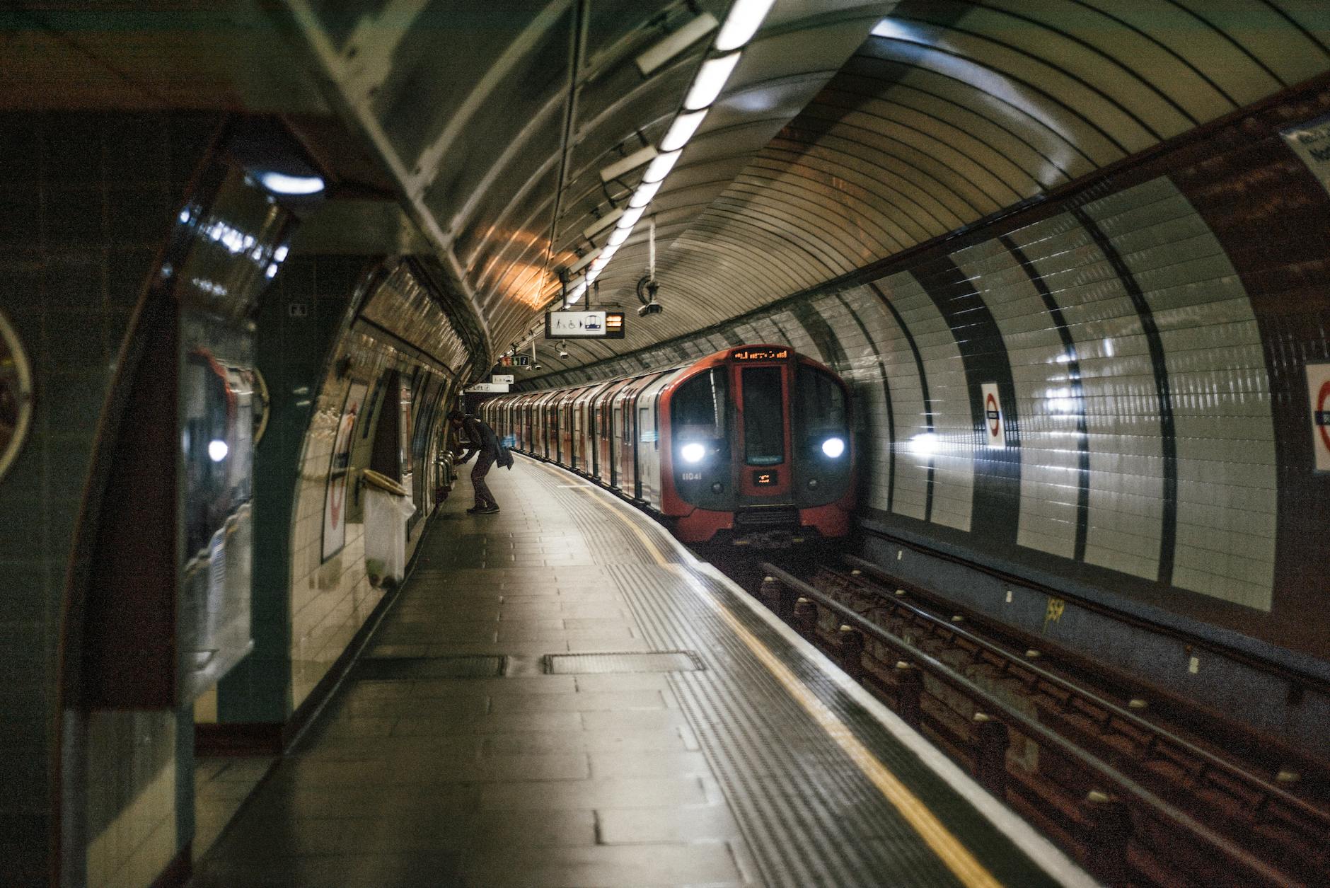 train moving in an underground train station